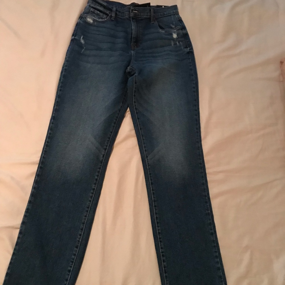 Long boot cut jeans.